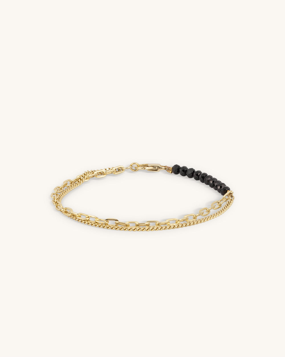 Treasure - Black Spinel. Gold.